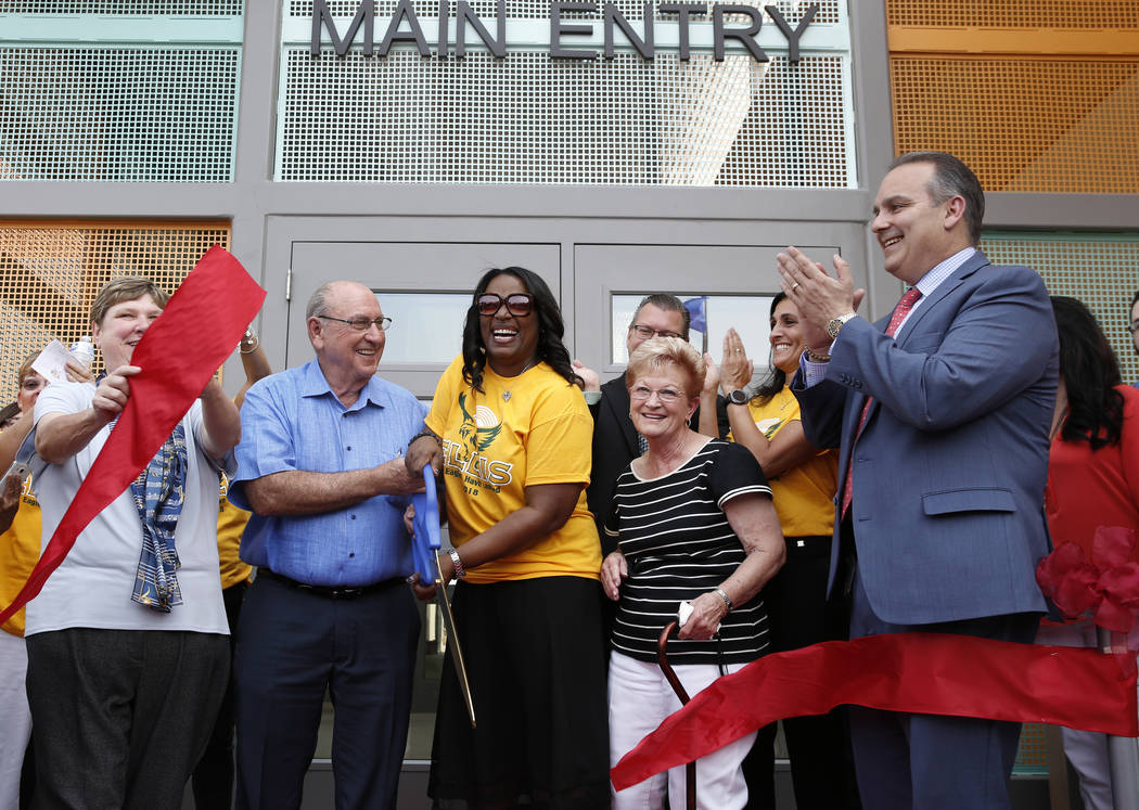 Deanna Wright, CCSD Board president, left, Robert Ellis, second left, and his wife Sandra, second right, philanthropic partners of the Clark County School District, Principal Dr. Shaun Cochran-Hal ...