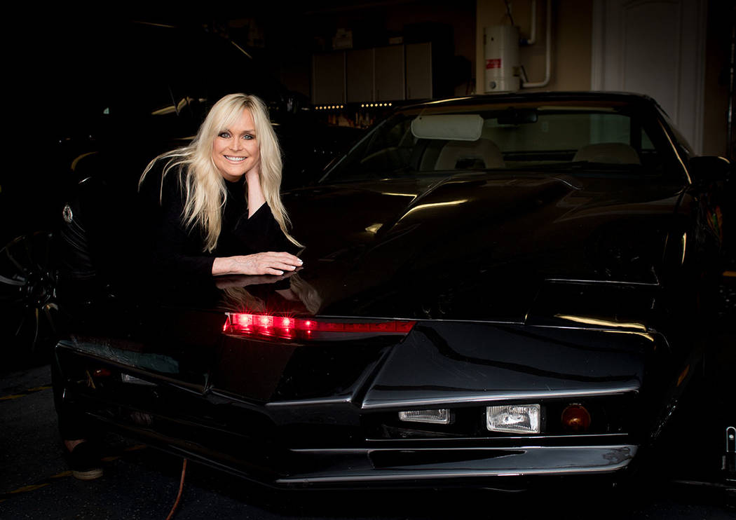 Catherine Hickland with KITT, the talking car from “Knight Rider." She had a role in the 1980s show. (Tonya Harvey Real Estate Millions)