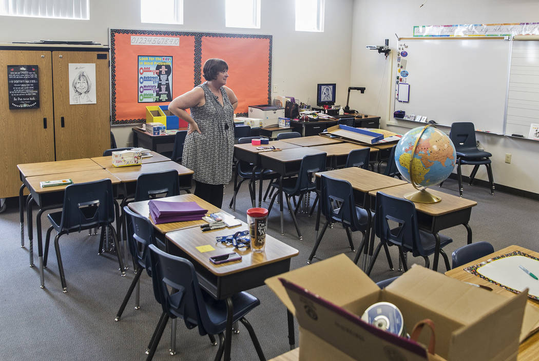 Third grade teacher Denise Lovern prepares her classroom at Steele Elementary School on Thursday, Aug., 9, 2018, in Las Vegas. Benjamin Hager Las Vegas Review-Journal @benjaminhphoto