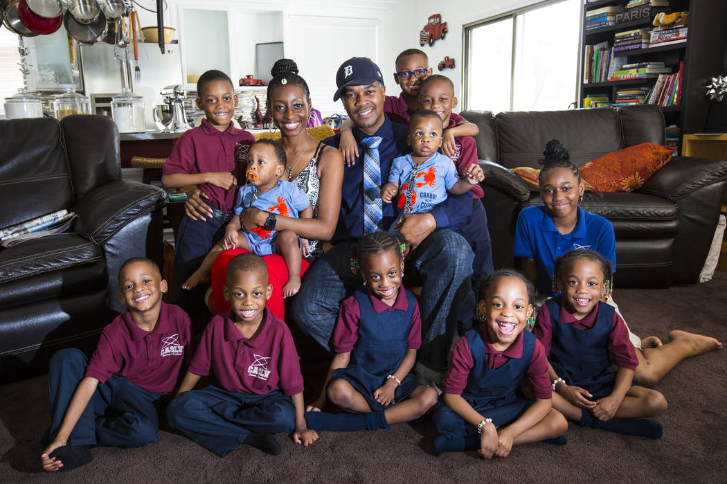Deon Derrico, center, with wife, Karen Evonne Derrico, and their 11 children at their home in North Las Vegas on Wednesday, Aug. 15, 2018. Chase Stevens Las Vegas Review-Journal @csstevensphoto