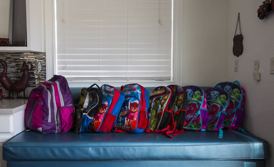 Backpacks belonging to the children of Deon Derrico at their home in North Las Vegas on Wednesday, Aug. 15, 2018. Chase Stevens Las Vegas Review-Journal @csstevensphoto