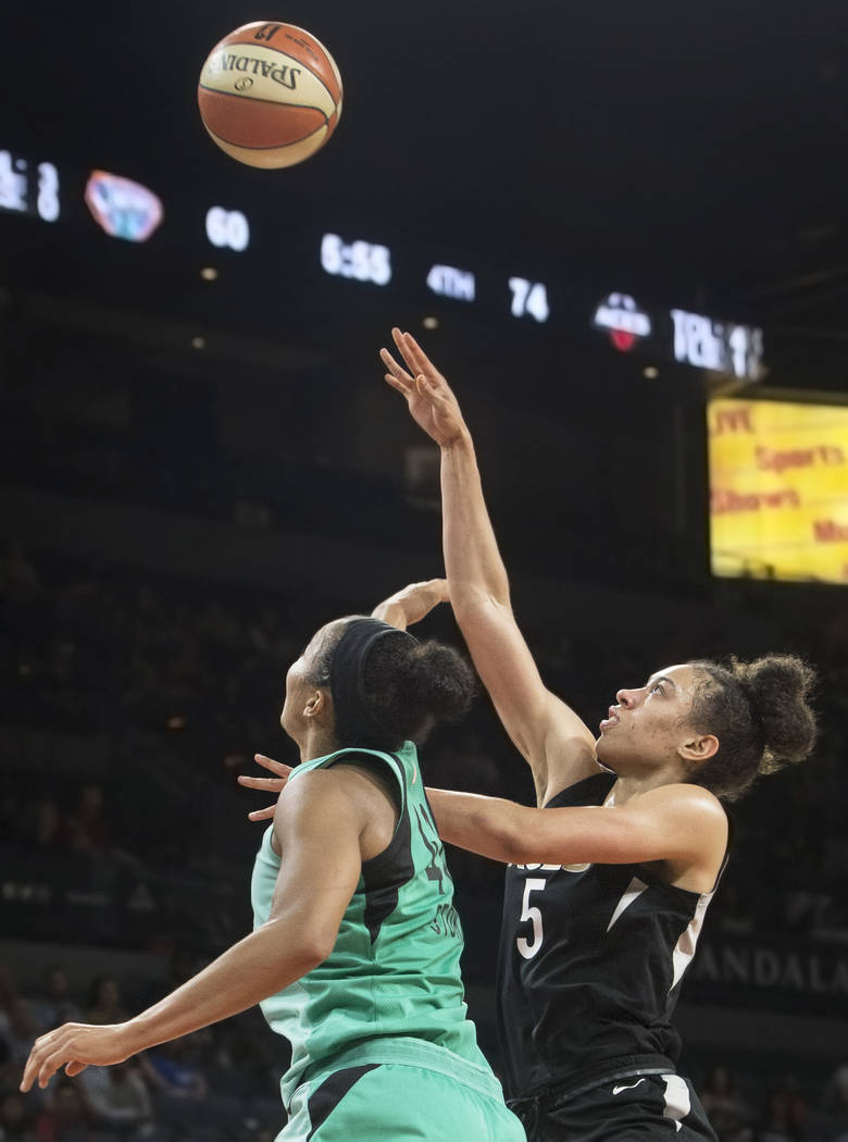 Aces forward Dearica Hamby (5) shoots over New York Liberty guard Kiah Stokes (41) in the fourth quarter on Wednesday, Aug. 15, 2018, at the Mandalay Bay Events Center, in Las Vegas. Benjamin Hage ...