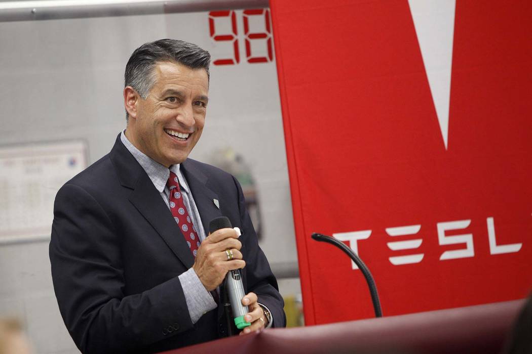 Gov. Brian Sandoval speaks at an event about robotics for education throughout the state at Cimarron-Memorial High School in Las Vegas, Monday, Aug. 13, 2018. (Rachel Aston/Las Vegas Review-Journa ...