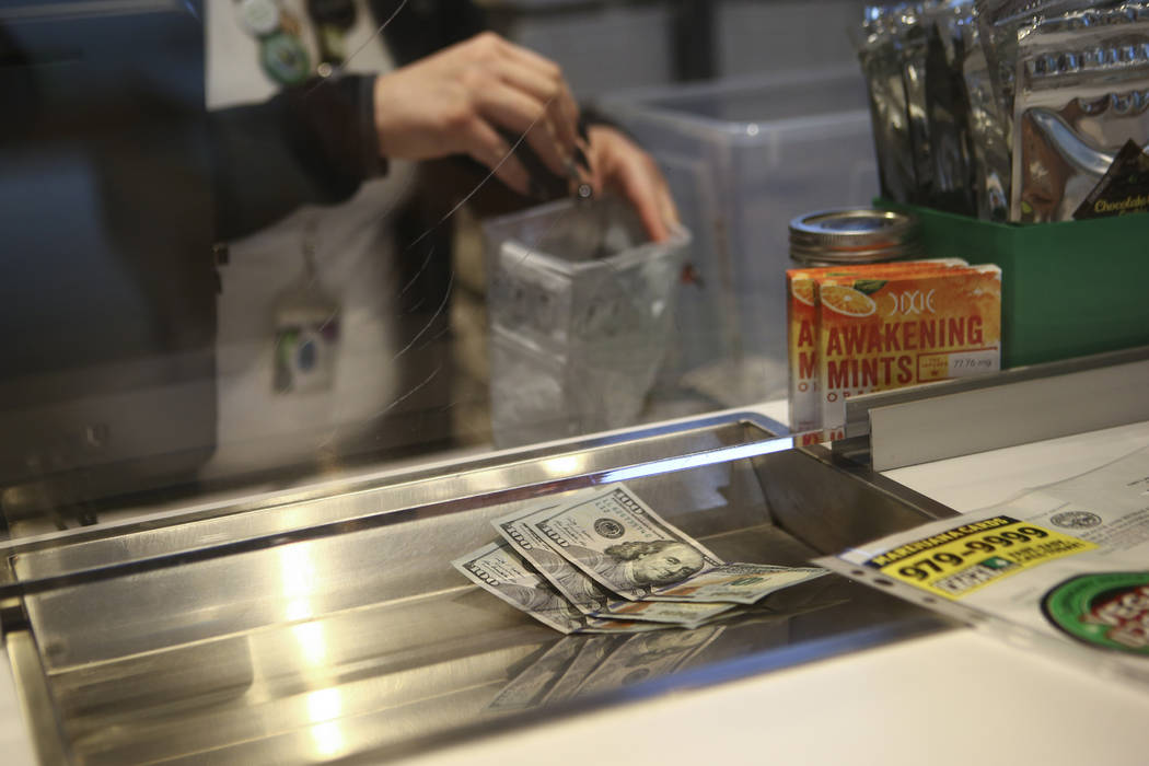 Money for products at medical marijuana dispensary The Source in Las Vegas on Thursday, March 30, 2017. (Chase Stevens/Las Vegas Review-Journal) @csstevensphoto