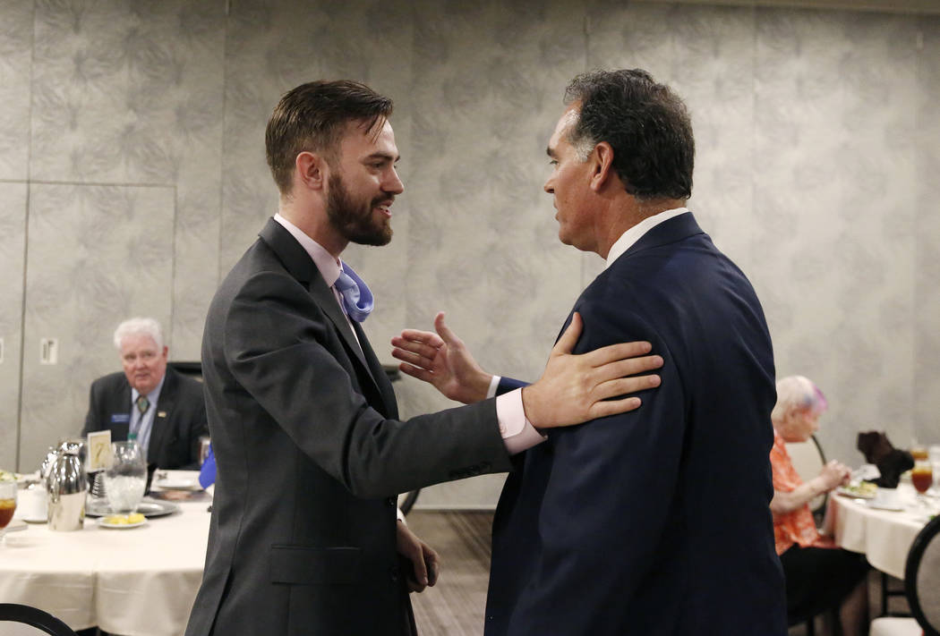 Paris Wade, left, Republican candidate for State Assembly, and Danny Tarkanian, Republican candidate for the 3rd Congressional District, greet each other during the Women's Chamber 2018 candidate ...