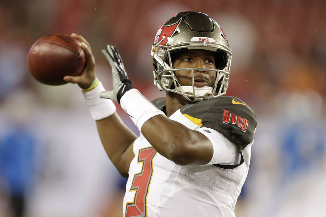 Tampa Bay Buccaneers quarterback Jameis Winston throws a pass before an NFL preseason football game against the Detroit Lions Friday, Aug. 24, 2018, in Tampa, Fla. (AP Photo/Chris O'Meara)