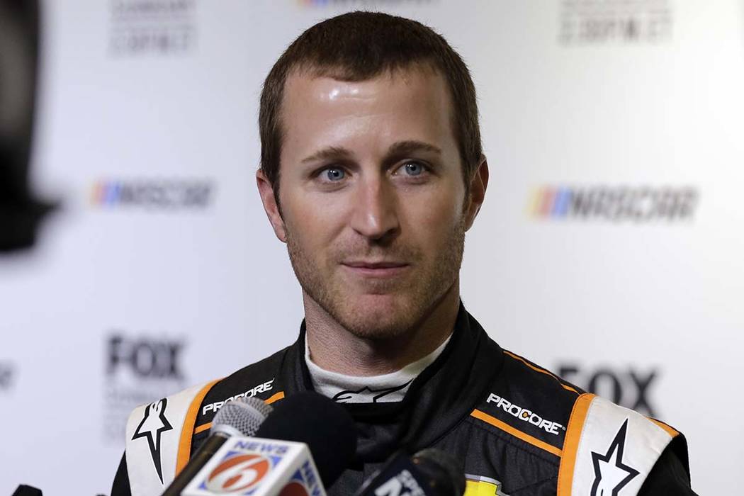 Kasey Kahne speaks during media day for the NASCAR Daytona 500 auto race at Daytona International Speedway in Daytona Beach, Fla., on Feb. 14, 2018. Kahne says he is retiring from full-time racing ...
