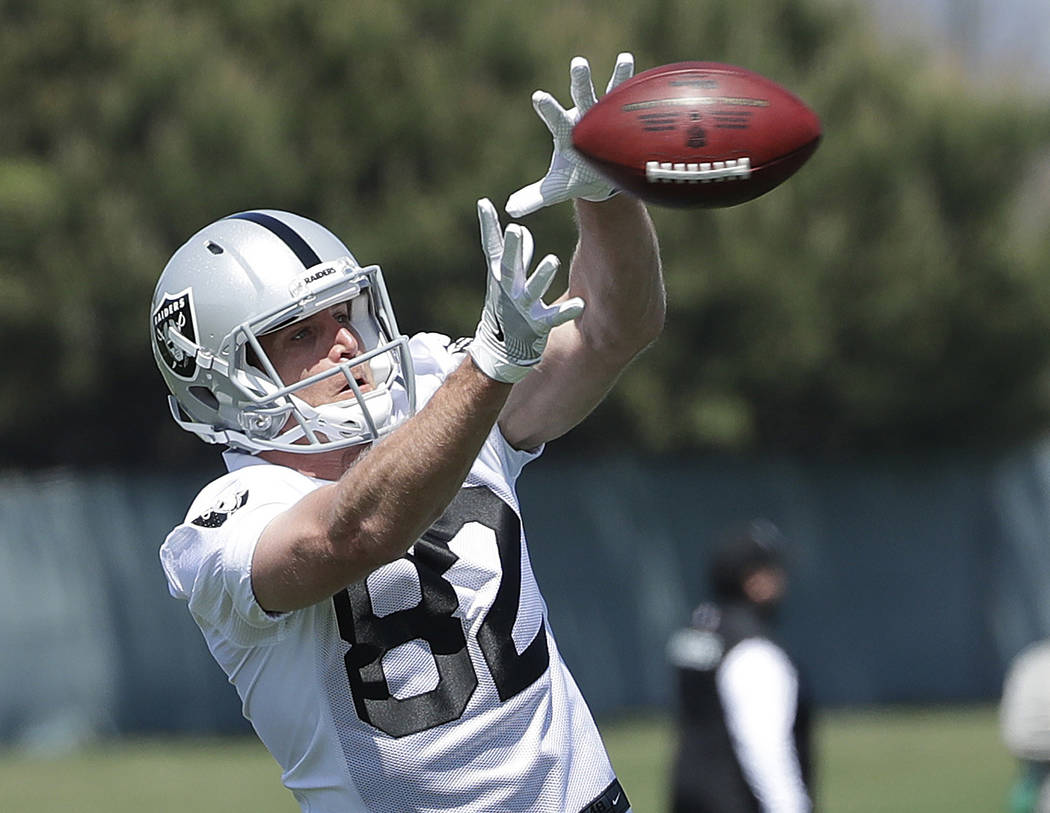 FILE - In this April 24, 2018, file photo, Oakland Raiders wide receiver Jordy Nelson catches a pass during practice at the team's NFL football facility in Alameda, Calif. Nelson has fit in right ...