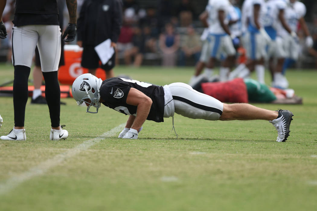 Oakland Raiders wide receiver Jordy Nelson (82) does push ups on his knuckles after missing a catch at the team's NFL training camp in Napa, Calif., Wednesday, Aug. 8, 2018. Heidi Fang Las Vegas R ...