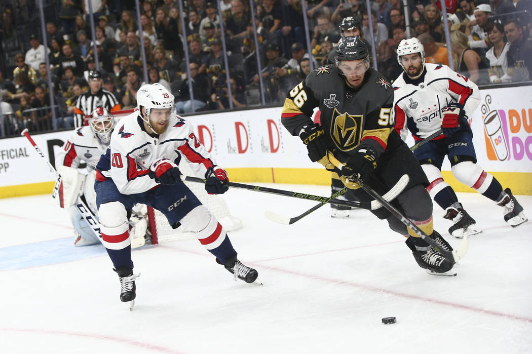 Golden Knights left wing Erik Haula (56) moves the puck against Washington Capitals center Lars Eller (20) during the third period of Game 5 of the Stanley Cup Final at T-Mobile Arena in Las Vegas ...