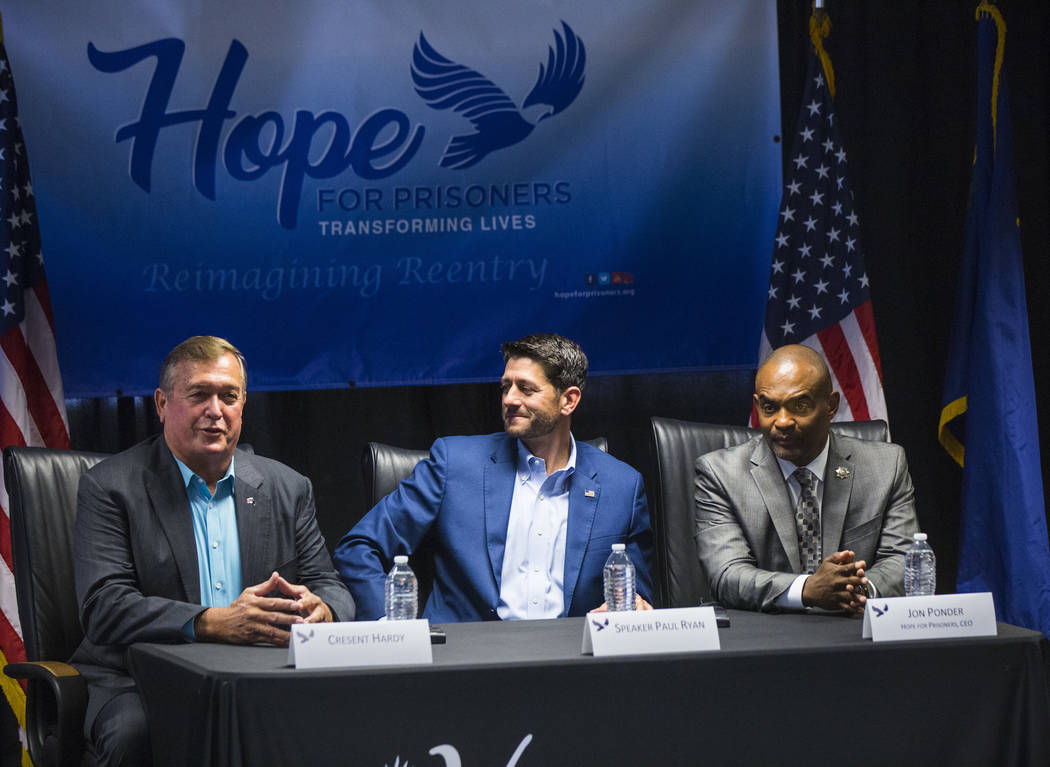 Former U.S. Rep. Cresent Hardy, left, speaks as House Speaker Paul Ryan, R-Wis., center, and Hope for Prisoners CEO Jon Ponder look on during a roundtable discussion at Hope for Prisoners in Las V ...