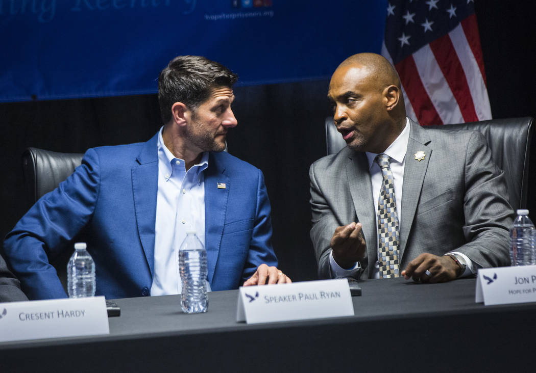House Speaker Paul Ryan, R-Wis., left, listens to Hope for Prisoners CEO Jon Ponder during a roundtable discussion at Hope for Prisoners in Las Vegas on Wednesday, Aug. 22, 2018. Chase Stevens Las ...