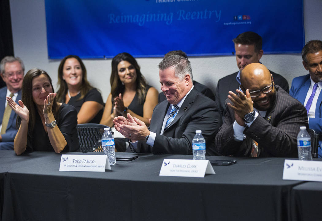 Lindy Schumacher, CEO of Fulfillment Fund Las Vegas, from left, Todd Fasulo, vice president of security and crisis management for Wynn Resorts, and Hope for Prisoners program graduate Charles Clar ...