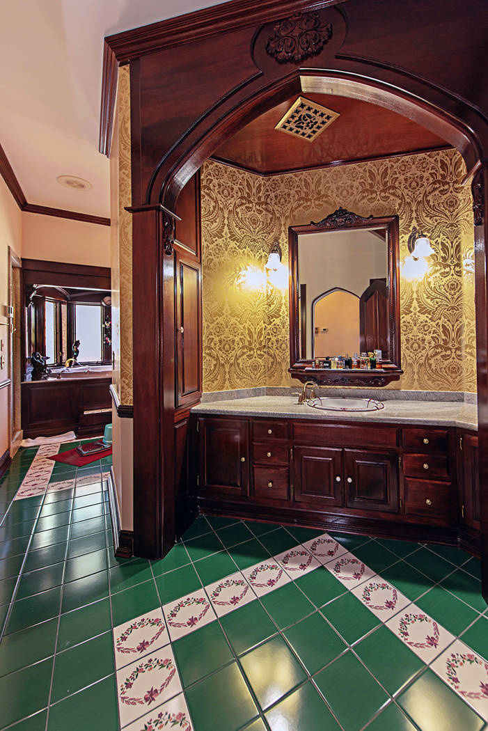 The master bath features a double vanity, jacuzzi tub and separate shower. (Rob Jensen Co.)