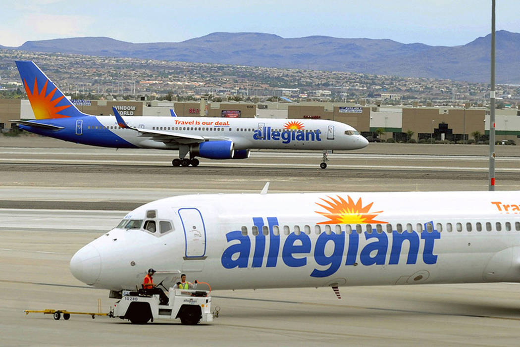 Allegiant Air jets taxi at McCarran International Airport in Las Vegas. (The Associated Press)