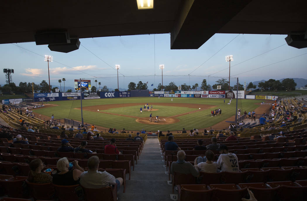 Collin Doebler and members of his crew prepare the infield before a Las Vegas 51s baseball game at Cashman Field in Las Vegas on Sunday, Aug. 12, 2018. Richard Brian Las Vegas Review-Journal @vega ...