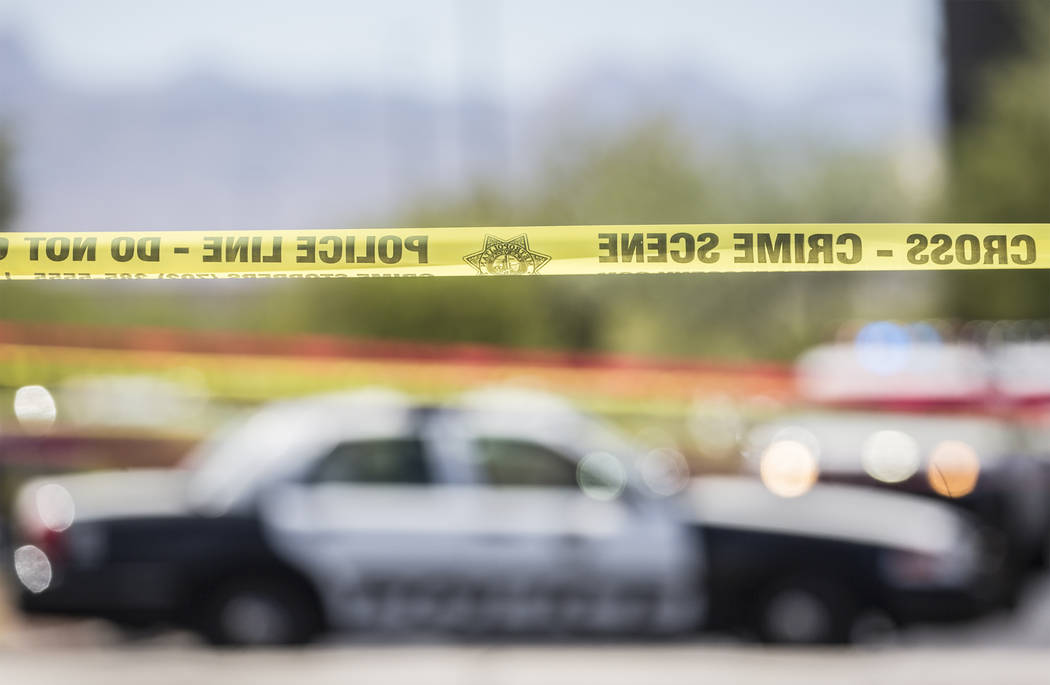 The Metropolitan Police Department investigates an officer involved shooting near Spring Mountain Road and Rainbow Boulevard on Friday, Aug. 24, 2018, in Las Vegas. Benjamin Hager Las Vegas Review ...