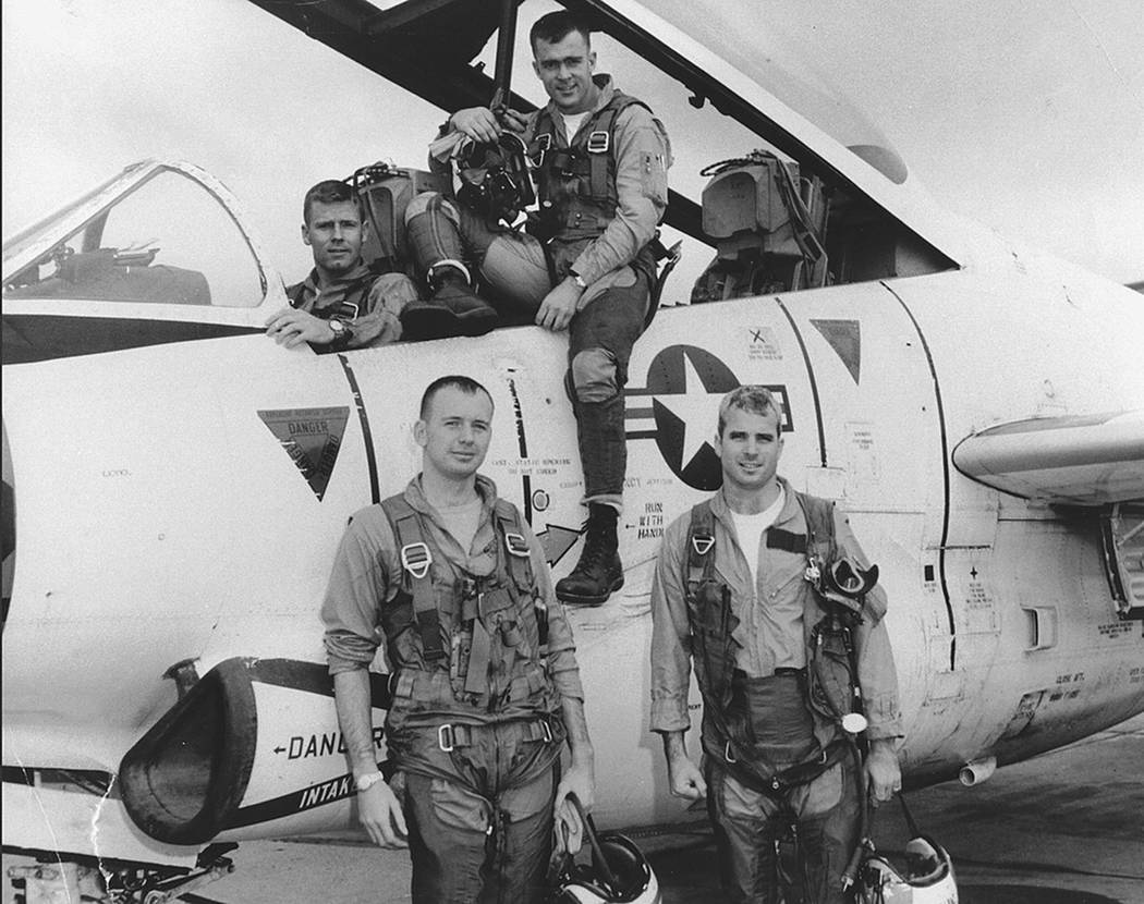 This photo provided by the Library of Congress shows John McCain, (front, right) with his squadron in 1965. McCain, a former Navy fighter pilot, was captured by the Vietnamese, tortured and impris ...