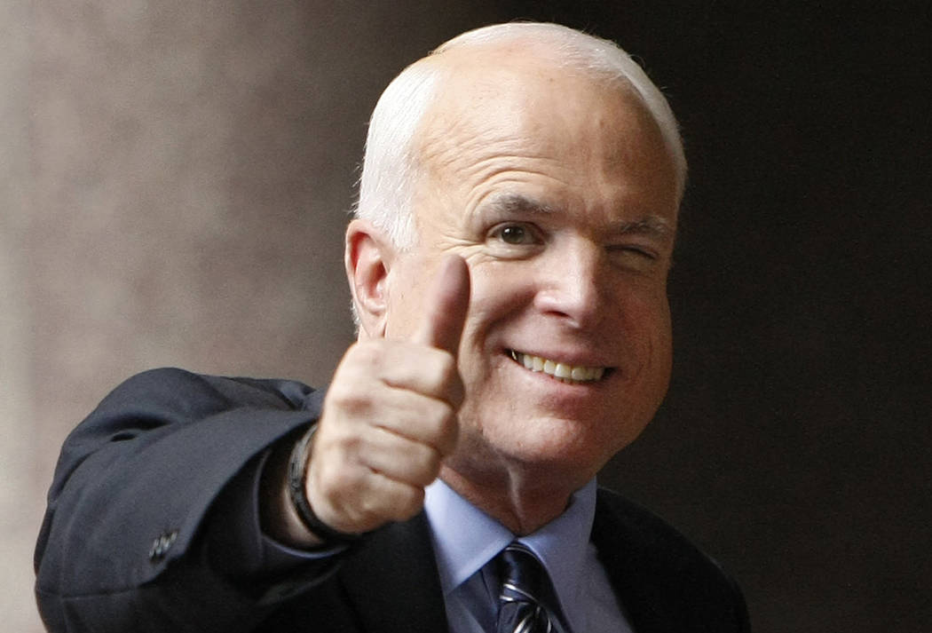 FILE - In this Sept. 28, 2008 file photo, Republican presidential candidate, Sen. John McCain, R-Ariz., gives a thumbs up as he arrives at his campaign headquarters in Arlington, Va. McCainÕ ...