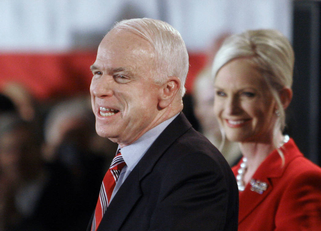 FILE - In this Jan. 8, 2008 file photo, Republican presidential hopeful Sen. John McCain, R-Ariz., with wife Cindy alongside, addresses supporters on election night in Nashua, N.H. McCain's famil ...