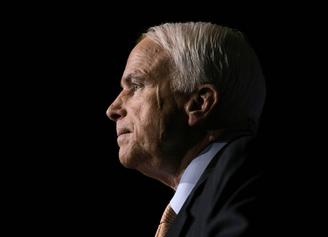 FILE -- In this Nov. 16, 2006, file photo Sen. John McCain, R-Ariz., pauses while speaking to the GOPAC Fall Charter Meeting in Washington. McCain's family said in a statement on Aug. 24, 2018, th ...