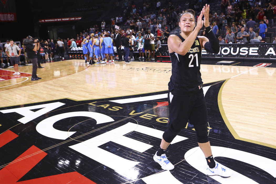 Las Vegas Aces guard Kayla McBride (21) celebrate's her team's defeat over Chicago Sky in a WNBA basketball game at Mandalay Bay Events Center in Las Vegas on Thursday, July 5, 2018. Chase Stevens ...