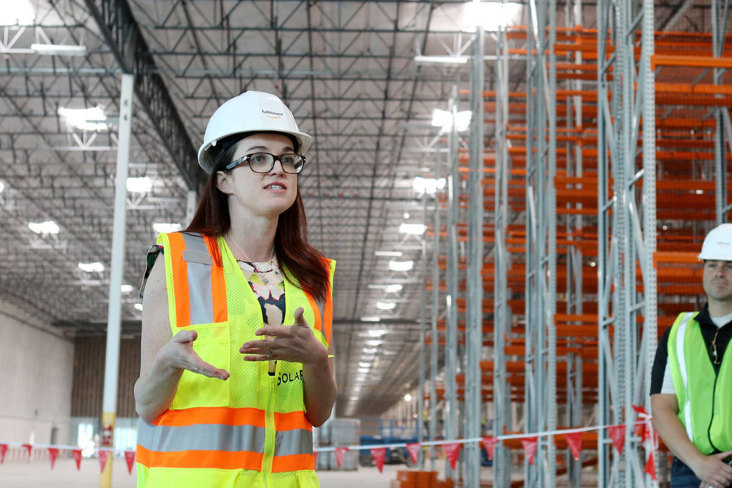 Amazon spokesperson Ashley Robison gives a tour of the newest Amazon warehouse that is under construction at Apex Industrial Park in North Las Vegas on March 27. (Elizabeth Brumley Las Vegas Busin ...