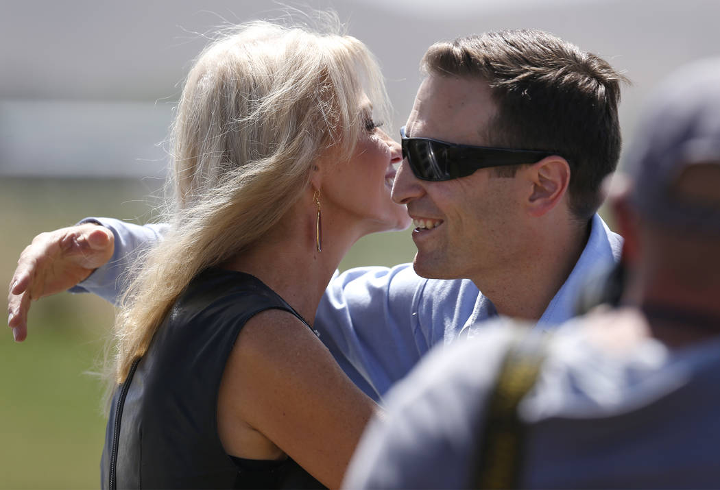 Kellyanne Conway hugs Nevada Attorney General Adam Laxalt following her speech at the 4th annual Basque Fry in Gardnerville, Nev., on Saturday, Aug. 25, 2018. Hosted by the Morning in Nevada PAC, ...