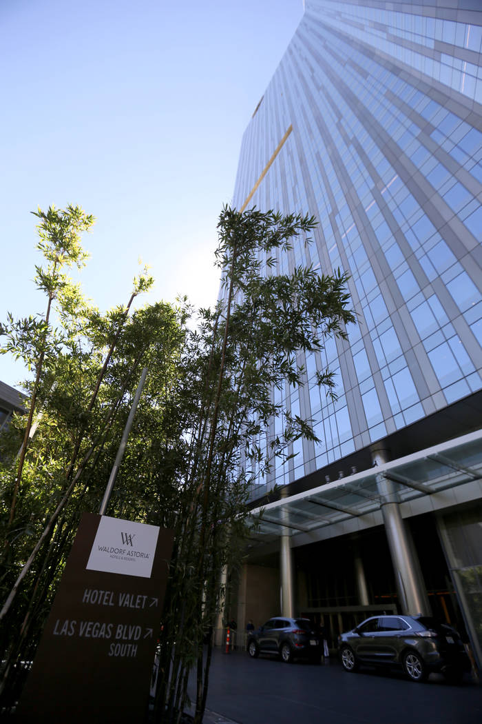 Temporary signs direct traffic in the valet area of the Waldorf Astoria on the first day for the new Las Vegas hotel formerly known as Mandarin Oriental on the Strip Friday, Aug. 31, 2018. K.M. Ca ...