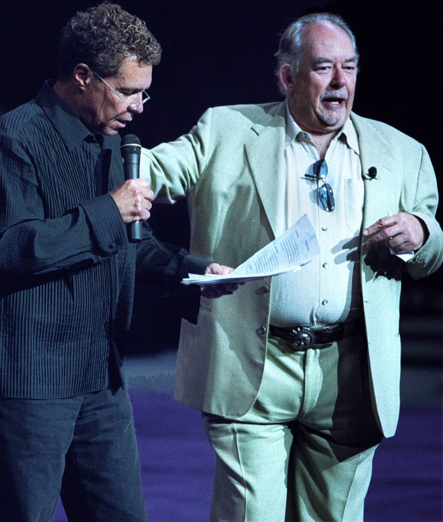Clint Holmes, left, hosts Animal Foundation's "Best in Show." and Robin Leach served as celebrity judge.(Ralph Fountain/Las Vegas Review-Journal)
