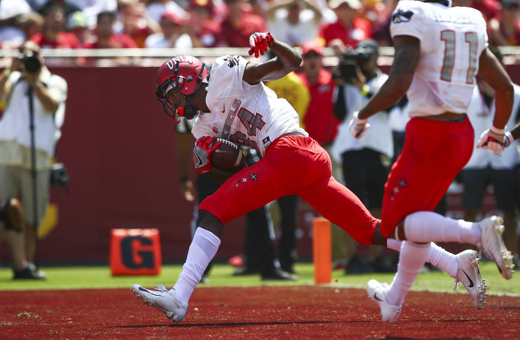 UNLV Rebels wide receiver Kendal Keys (84) scores a touchdown against the USC Trojans during the first half of a football game at the Los Angeles Memorial Coliseum in Los Angeles on Saturday, Sept ...
