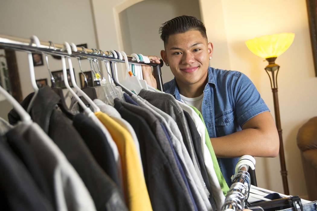 Eighteen-year-old Dylan Sanglay, who created his own clothing company and uses proceeds to buy clothes for the homeless, poses at his home in the Sunrise Manor area of Las Vegas on Sunday, Aug. 26 ...
