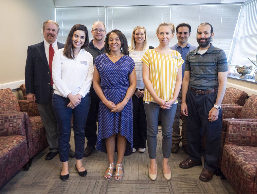 Jamie Davidson, associate vice president for student wellness at UNLV, far left, photographed with seven of the eight staff members added to its mental health services at the Student Recreation an ...