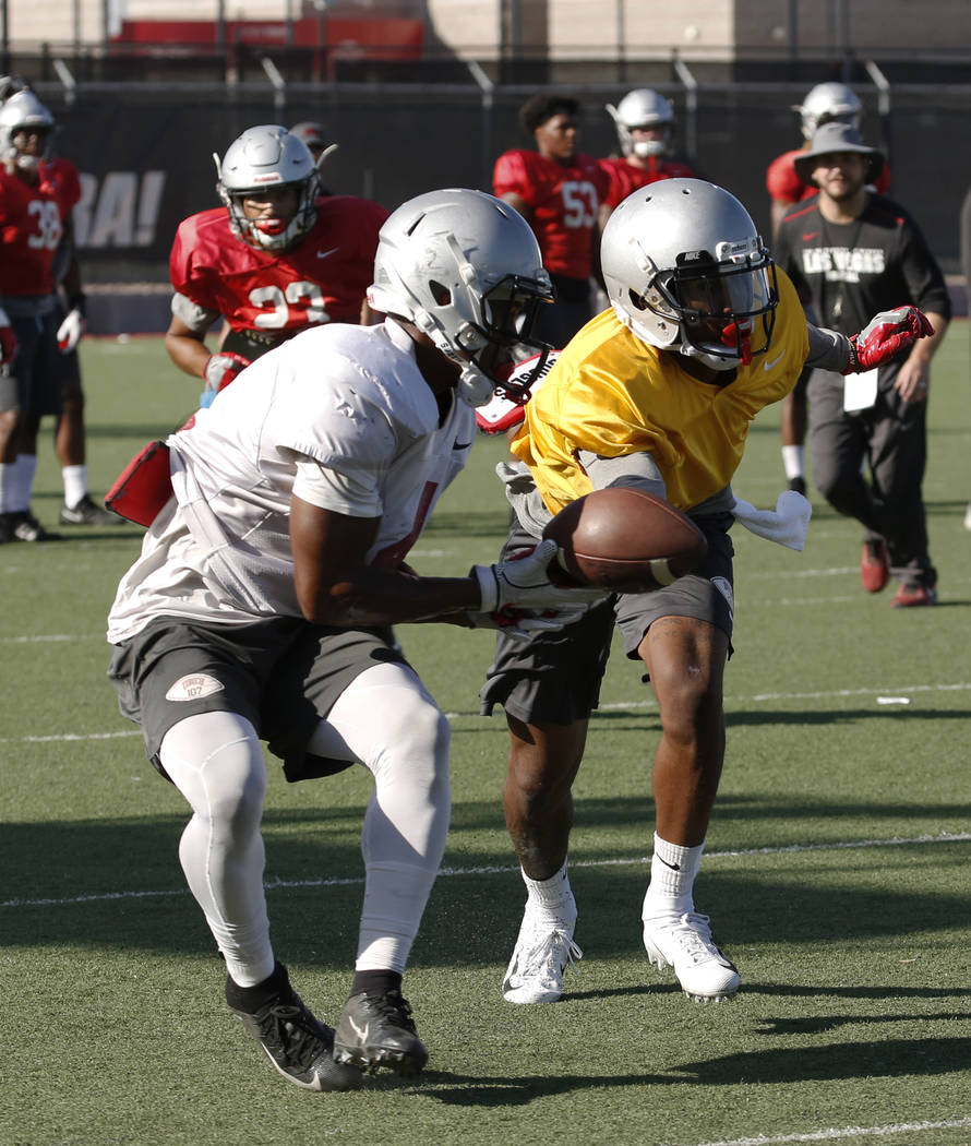 UNLV cornerback Alex Perry, right, blocks a pass during team practice on Wednesday, Sept. 5, 2018, in Las Vegas. (Bizuayehu Tesfaye/Las Vegas Review-Journal) @bizutesfaye