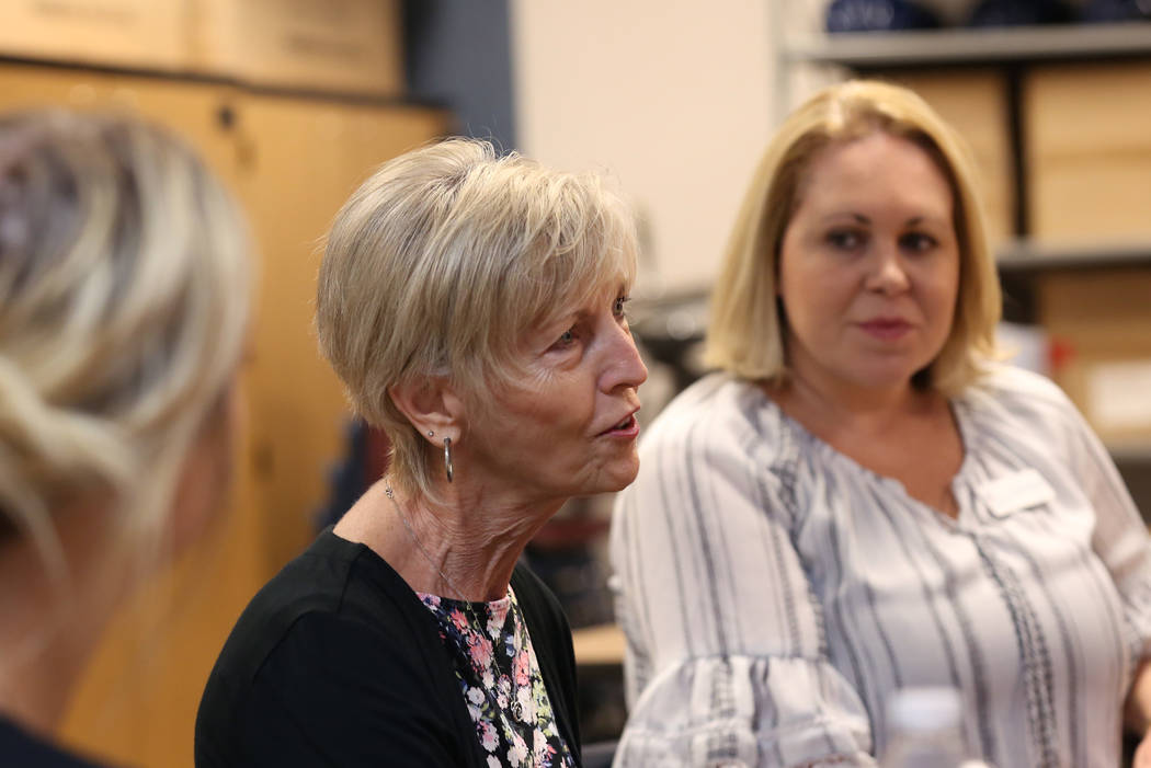 Cheri Ward, center, executive director of Communities In Schools (CIS) of Southern Nevada, speaks as Jennifer Bulloch, program director at CIS, Looks on during an interview with the Las Vegas Revi ...