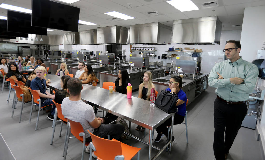 Todd Uglow, right, teaches Special Events Management class in the Marriott Executive Kitchen in Hospitality Hall at UNLV Thursday, Aug. 30, 2018. K.M. Cannon Las Vegas Review-Journal @KMCannonPhoto