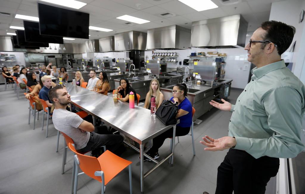 Todd Uglow, right, teaches Special Events Management class in the Marriott Executive Kitchen in Hospitality Hall at UNLV Thursday, Aug. 30, 2018. K.M. Cannon Las Vegas Review-Journal @KMCannonPhoto