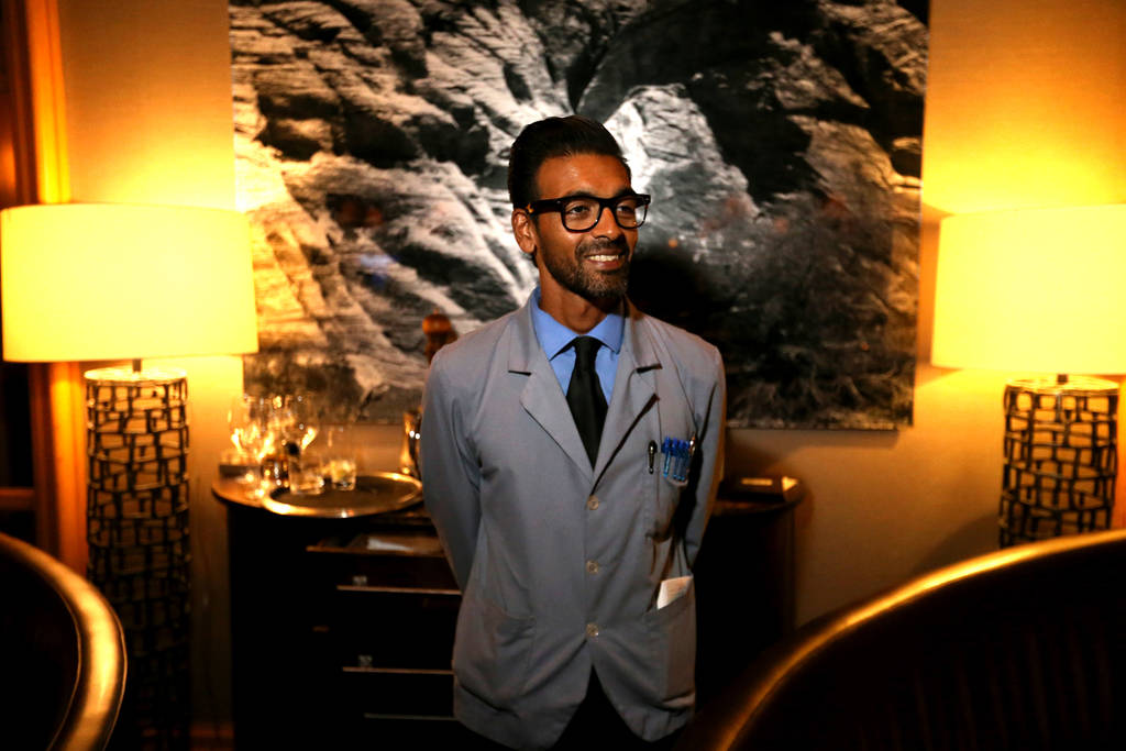 Captain server Yash Gokul keeps an eye on his tables at Charlie Palmer Steak at the Four Seasons in Las Vegas Tuesday, Aug. 28, 2018. K.M. Cannon Las Vegas Review-Journal @KMCannonPhoto