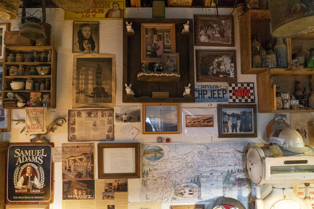 Photos, posters, maps and more old western memorabilia photographed in Walt Kremin's saloon at Gold Point, Tuesday, Sept. 4, 2018. After a decades long property dispute, the Bureau of Land Managem ...