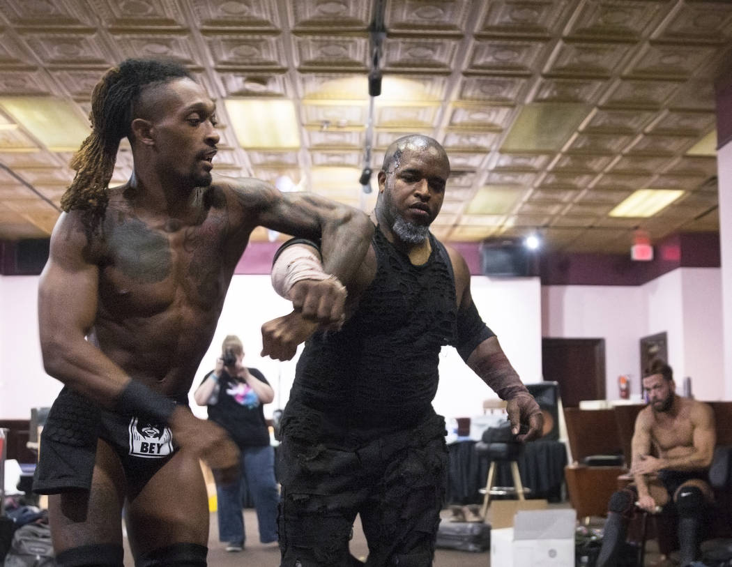 Chris Bey, left, practices with Wes Logan, aka "Beast the Butcher" before the start of their Versus Wrestling match on Friday, Aug., 3, 2018, at Neonopolis, in Las Vegas. Benjamin Hager ...