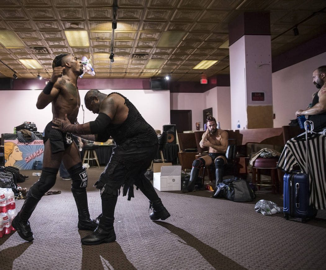 Chris Bey, left, practices with Wes Logan, aka "Beast the Butcher" before the start of their Versus Wrestling match on Friday, Aug., 3, 2018, at Neonopolis, in Las Vegas. Benjamin Hager ...