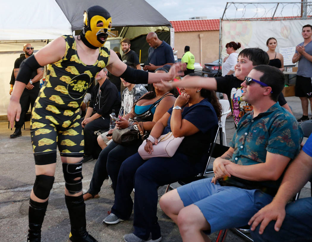 Macho Mouse gets a high-five after his fight during a Versus Pro Wrestling event at 1429 S. Commerce St. in Las Vegas, Friday, July 6, 2018. Chitose Suzuki Las Vegas Review-Journal @chitosephoto