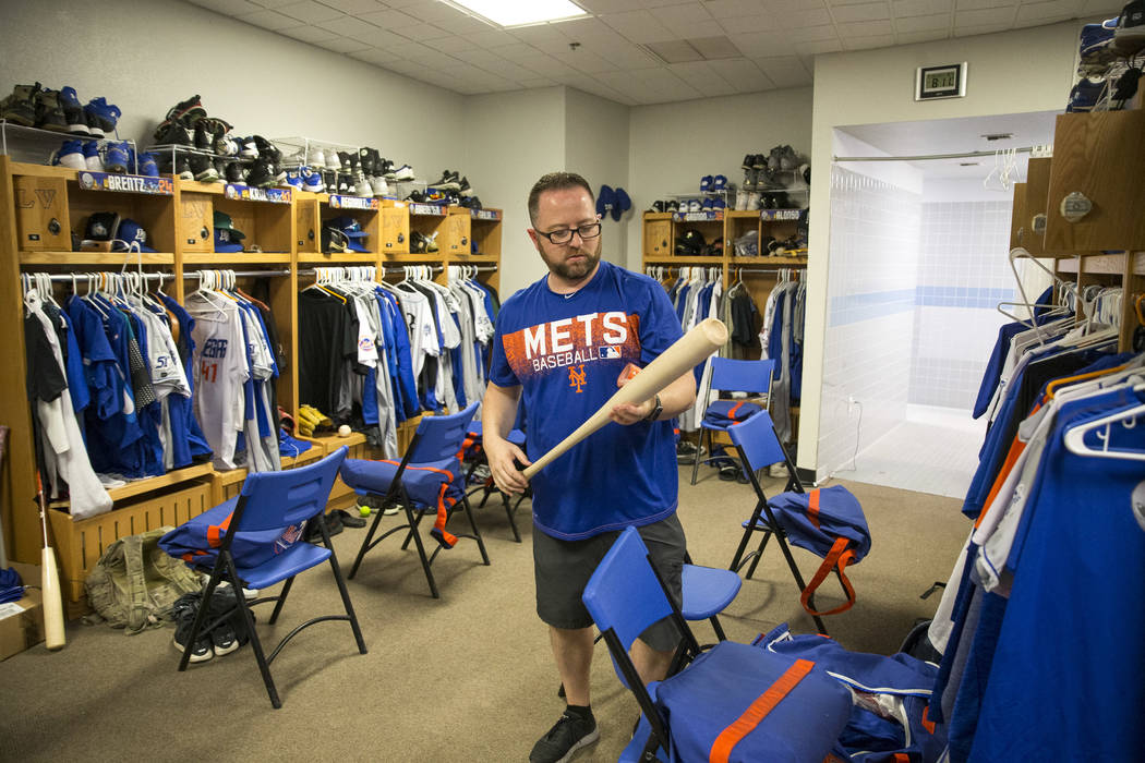 51's clubhouse manager Steve Dwyer pulls a bat for a player during baseball game at Cashman Field in Las Vegas on Thursday, Aug. 23, 2018. Richard Brian Las Vegas Review-Journal @vegasphotograph