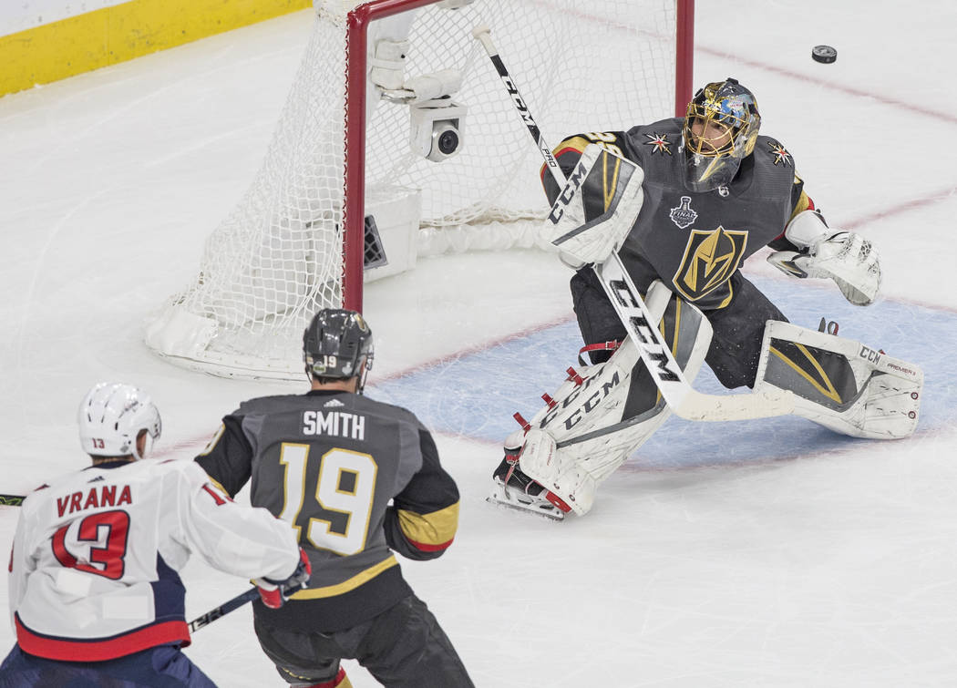 Golden Knights goaltender Marc-Andre Fleury (29) makes a save in the first period during Game 5 of the NHL Stanley Cup Final against the Washington Capitals on Thursday, June 7, 2018, at T-Mobile ...