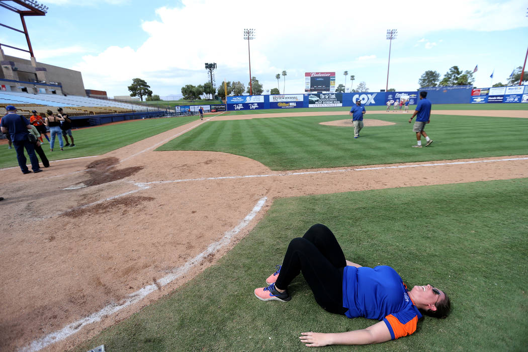 Director of Ticket Operations Siobhan Steiermann relishes the field after the Las Vegas 51s final game ever at Cashman Field in Las Vegas Monday, Sept. 3, 2018. The team will move to a new stadium ...