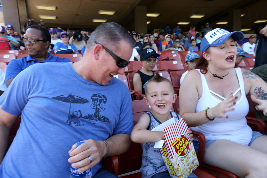 Caleb Williams, 4, with his parents Scott and Mical-Anne before the Las Vegas 51s final game ever at Cashman Field in Las Vegas Monday, Sept. 3, 2018. The team will move to a new stadium in Summer ...