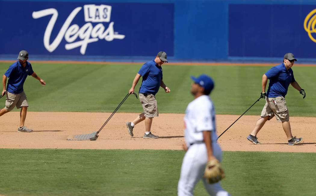 The ground crew works the infield between innings during the Las Vegas 51s final game ever at Cashman Field in Las Vegas Monday, Sept. 3, 2018. The team will move to a new stadium in Summerlin nex ...