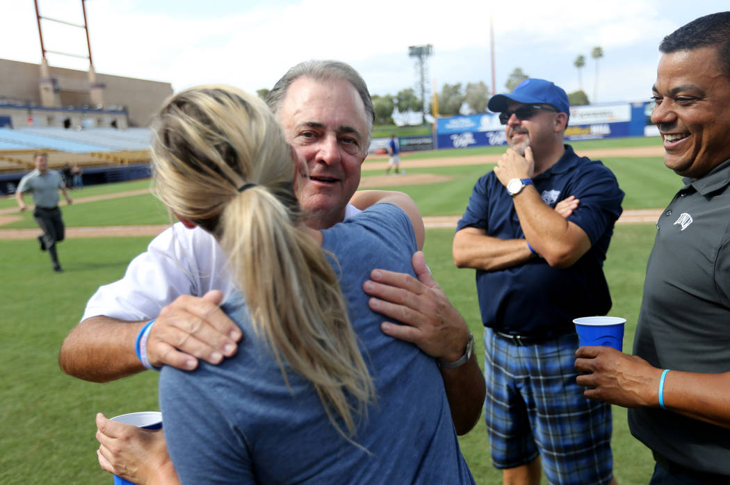 Las Vegas team president Don Logan hugs Shelby Little after the final 51s game ever at Cashman Field in Las Vegas Monday, Sept. 3, 2018. Las Vegas beat Sacramento 4-3. The team will move to a new ...