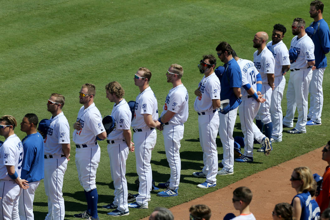 Las Vegas 51s stand during the National Anthem before their final game ever at Cashman Field in Las Vegas Monday, Sept. 3, 2018. The team will move to a new stadium in Summerlin next season. K.M. ...