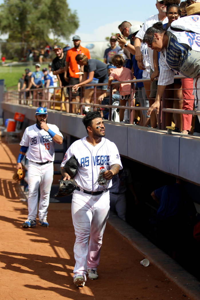 Las Vegas third baseman Christian Colon greets fans after the final 51s game ever at Cashman Field in Las Vegas Monday, Sept. 3, 2018. Las Vegas beat Sacramento 4-3. The team will move to a new s ...